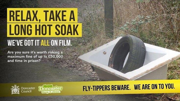 Fly-Tippers Beware Poster showing abandoned bath